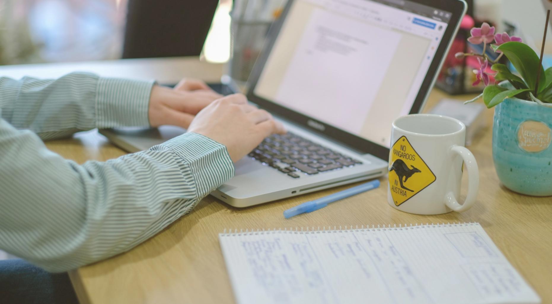 Simple budgeting workspace with clean notebook and calculator